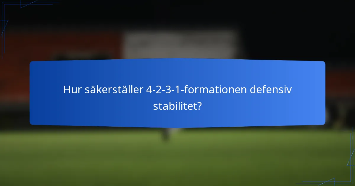 Hur säkerställer 4-2-3-1-formationen defensiv stabilitet?